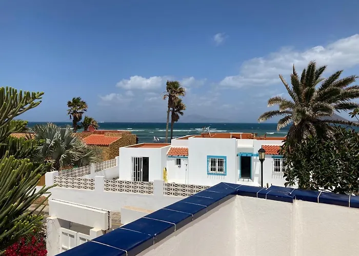 Beach House With The Heated Pool Next To Rocky Point